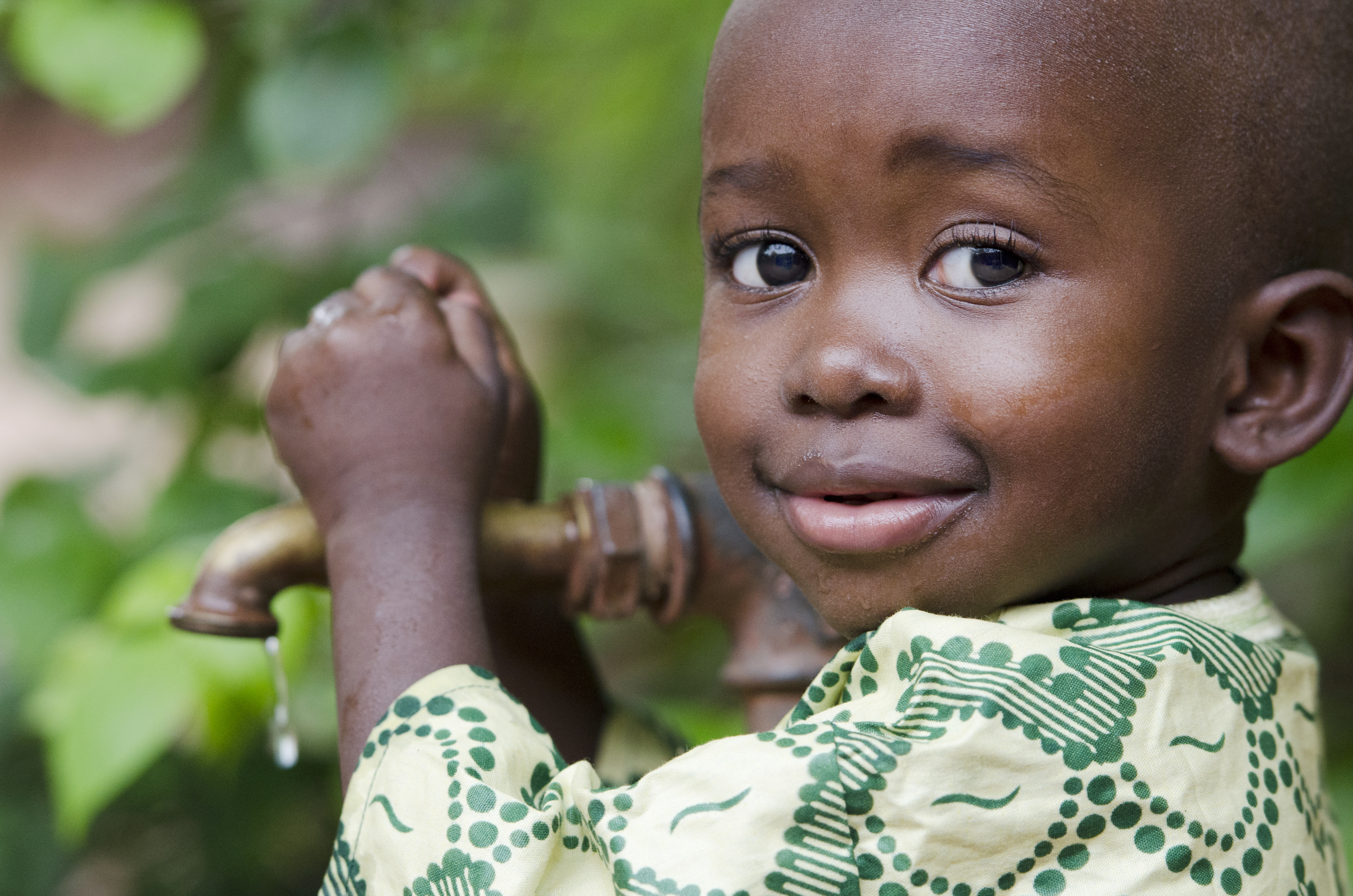 A child accessing clean water in Madagascar